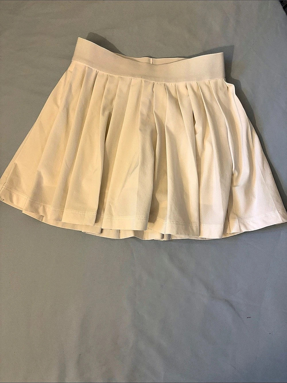 Athleta Girl Pleated Skirt in white Girls XS/6 Like New